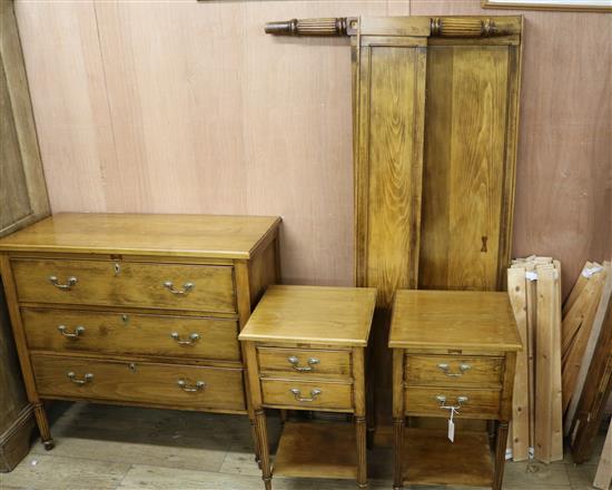 A four piece Directoire style bedroom suite, consisting of a double head and foot bedstead, a chest and pair of bedside cupboards Chest